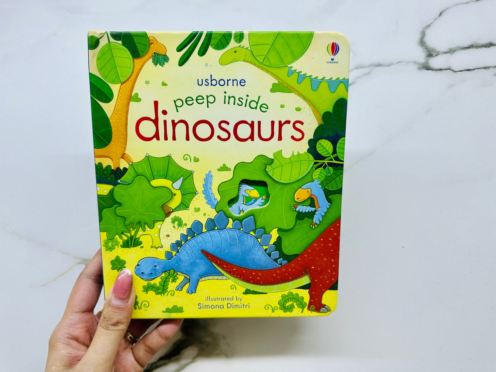 Usborne Peep Inside Dinosaurs